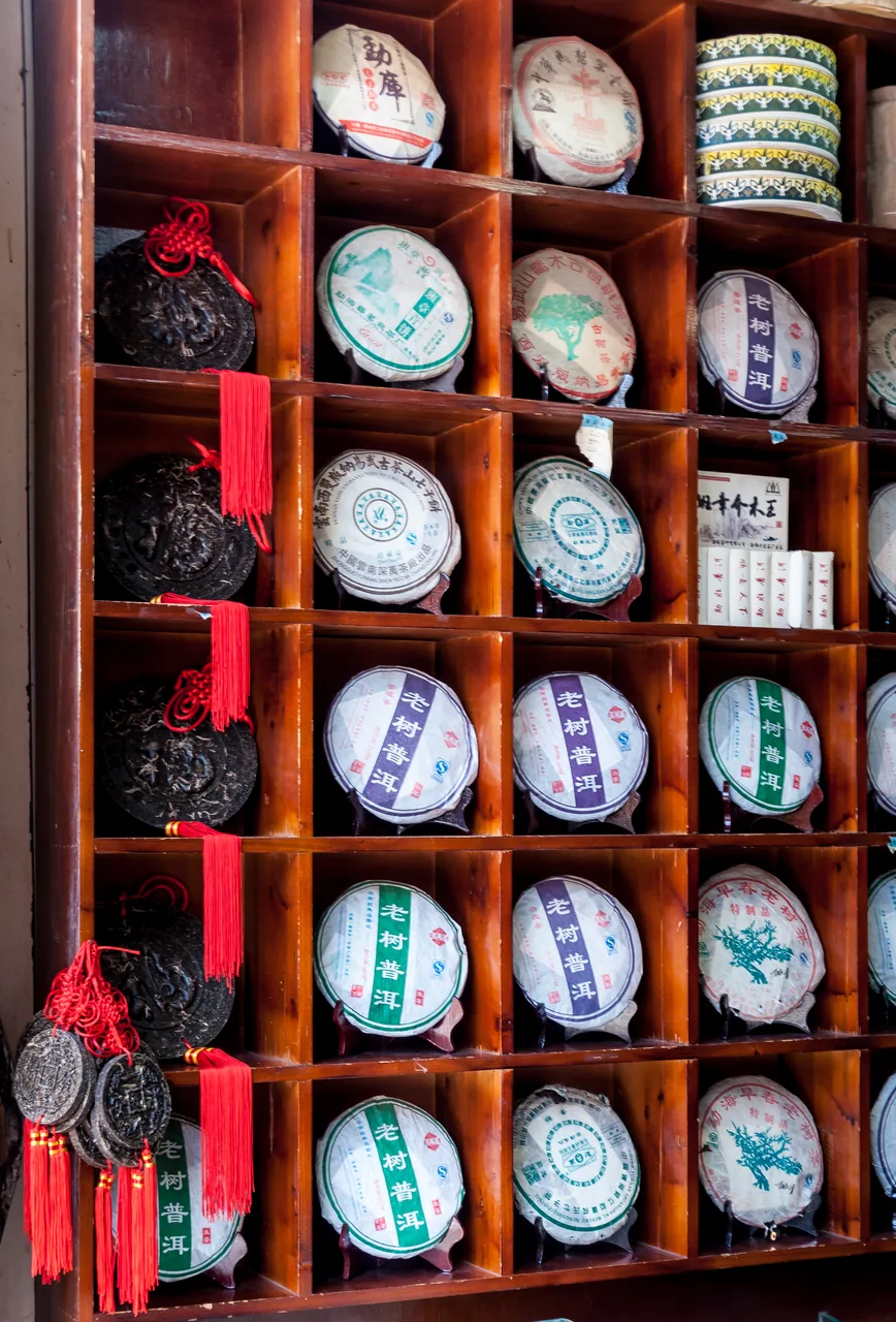 Photograph of a heritage tea shop displaying different tea brands in Lijiang, Yunnan, China