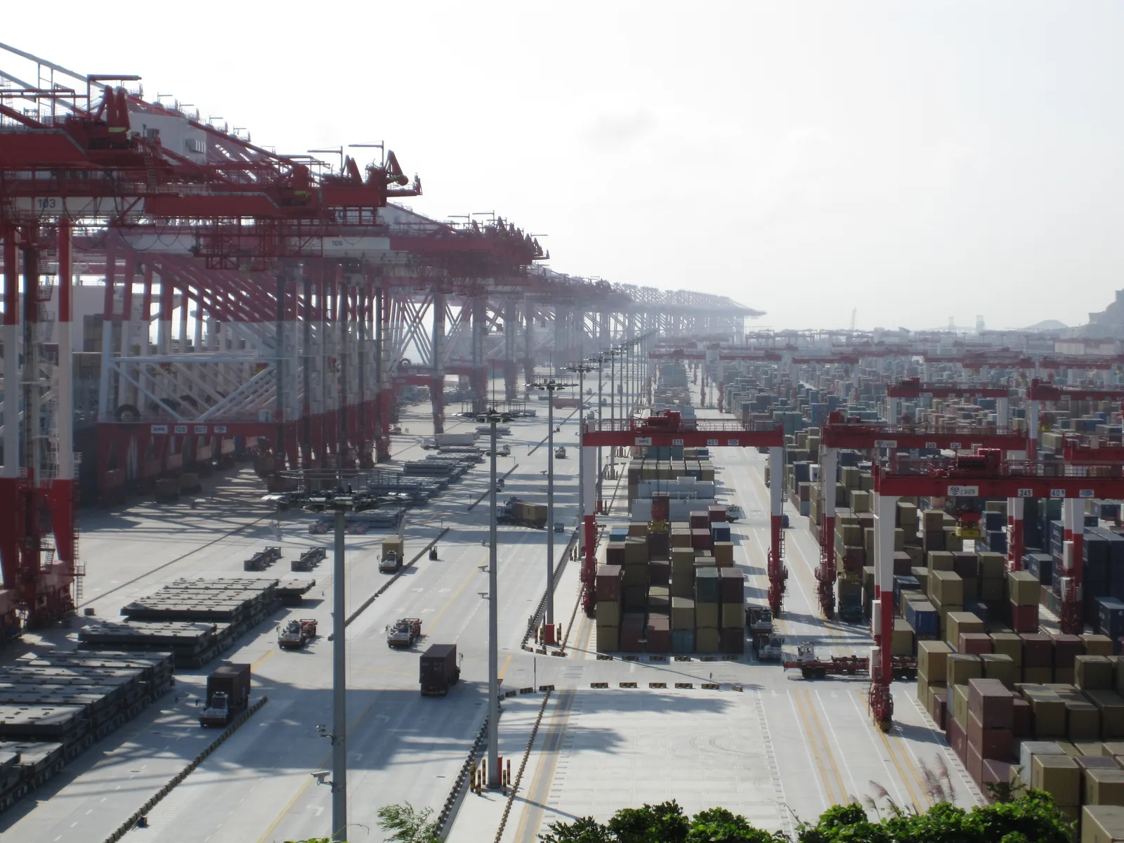 Containers and gantry cranes at Yangshan Deepwater Port near Shanghai, China
