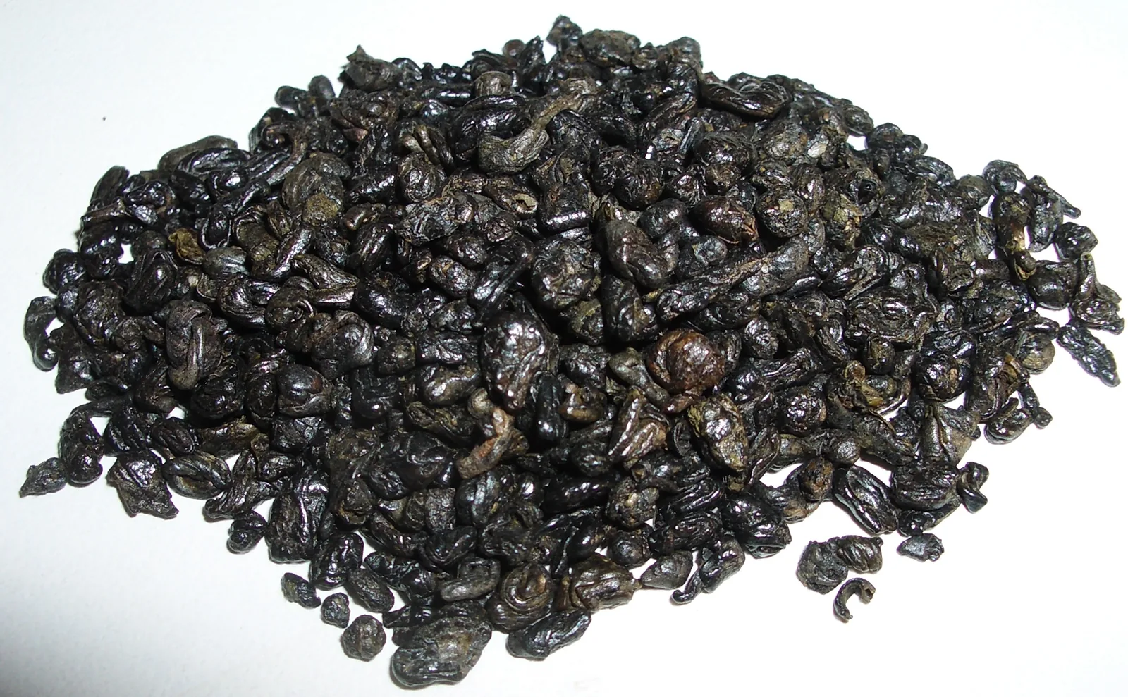Close-up photograph of rolled Chinese Gunpowder green tea leaves